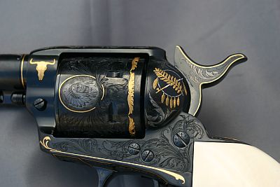 This Colt Single-Action Army Revolver was hot blued - Engraving and Gold by Jim Blair for the Colt Collectors Association